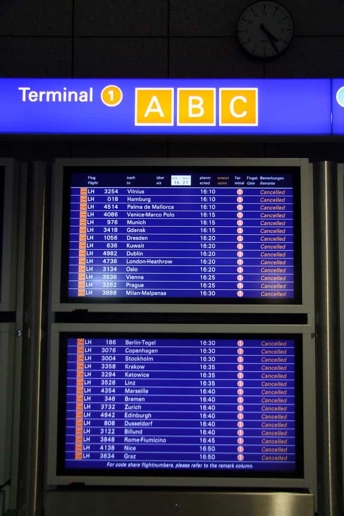 airport flight board showing all flights cancelled
